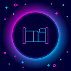 Glowing neon line Bed icon isolated on black background. Colorful outline concept. Vector