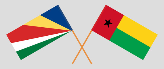 Crossed flags of Seychelles and Guinea-Bissau. Official colors. Correct proportion