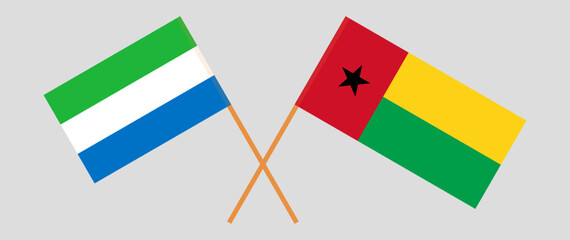 Crossed flags of Sierra Leone and Guinea-Bissau. Official colors. Correct proportion