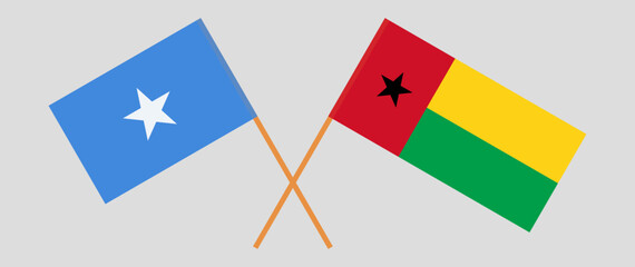 Crossed flags of Somalia and Guinea-Bissau. Official colors. Correct proportion