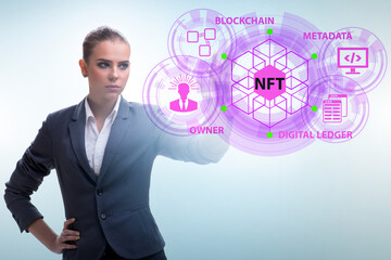 Businesswoman in NFT non fungible concept