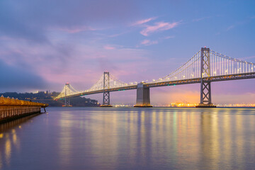Fototapeta premium Panorama view of the Bay Bridge at night 