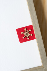 Christmas themed background with snowflake or star and wooden panel with frame