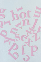 pink letters on embossed paper or high degree of heat and physical contact