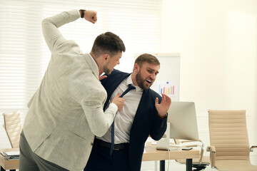 Emotional colleagues fighting in office. Workplace conflict