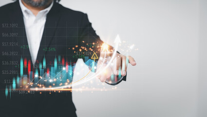 Development market and business investment concept. Businessman touching growth graph, and...