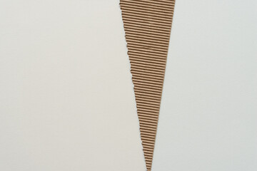 narrow corrugated triangle and blank paper
