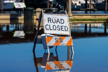 Road closed sign in flood