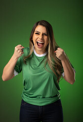 woman soccer fan cheering for her favorite club and team. world cup green background
