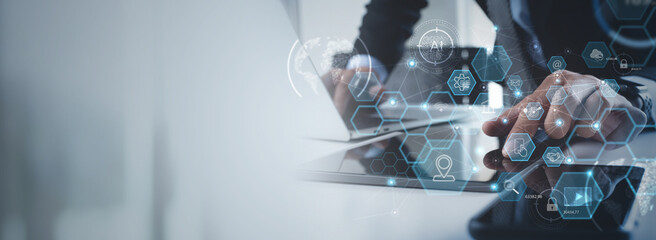 Digital marketing concept, Businessman using tablet analyzing economy finance and sale data on interface screen, technology icons.  Business strategy on global business network connection technology