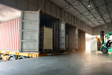 Fototapeta na wymiar Contaner Trailer Trucks Parked Loading at Dock Warehouse. Packaging Boxes. Shipping Cargo Container Delivery Trucks. Distribution Warehouse. Freight Trucks Cargo Transport. Warehouse Logistics. 