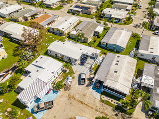Aerial drone photo of mobile home trailer parks in Fort Myers FL which sustained damage from...