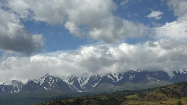 Time lapse video of Altai mountains in Kurai area with North Chuisky Ridge on background.