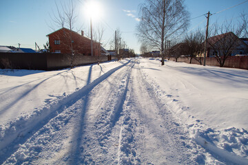 Road in the snow in winter as a background.