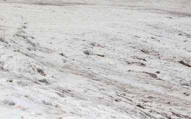 White volcanic limestone rock as background.