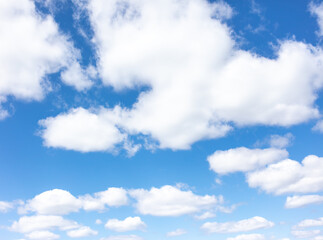 White clouds against the blue sky.