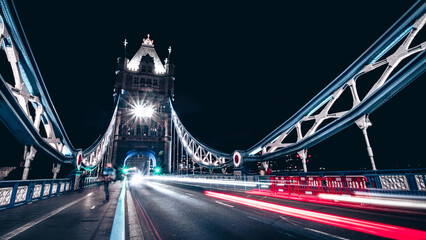 The Tower Bridge by night. Blurred car lights.