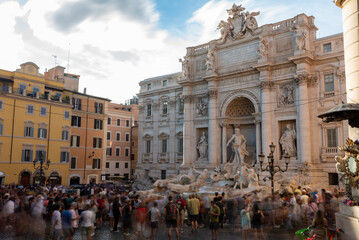 Long Exposition Shot of the Square in Front of The Trevi's Funtain in the Center of Rome at Sunset with Blurred People