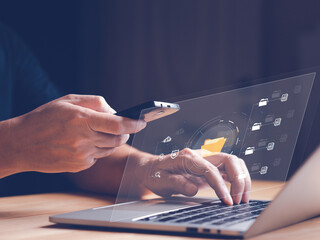 Hand holding smart phone to lock or unlock security system to access file folder in laptops....