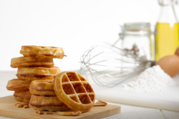 Stack of waffles  on white background with copy space