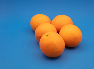 ORANGES ON A BLUE BACKGROUND