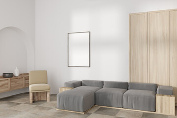 Stylish chill room interior with sofa and armchair, drawer and mockup frame
