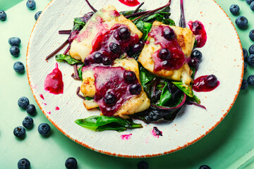 Baked fish,pangasius on white plate