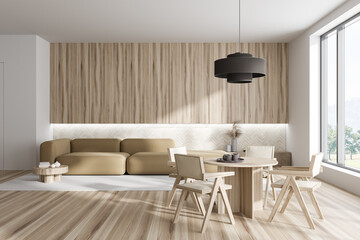 Stylish meeting room interior with couch, table and seats, panoramic window