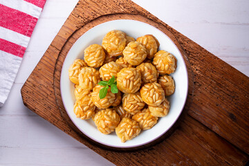 Pine nut penelles. Traditional autumn recipe for desserts made with marzipan in Barcelona
