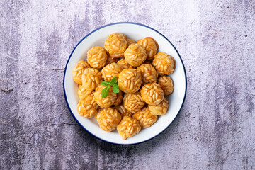 Pine nut penelles. Traditional autumn recipe for desserts made with marzipan in Barcelona