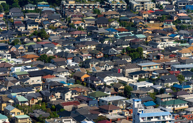 Greater Tokyo are dense buildings and houses at daytime.