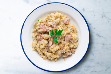 Catalan butifarra sausage risotto with parmesan. Mixed Spanish and Italian recipe.