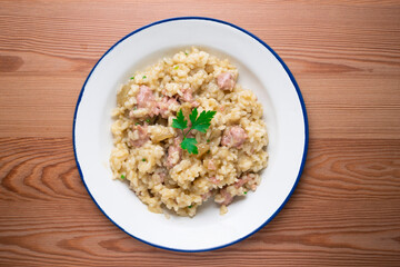 Catalan butifarra sausage risotto with parmesan. Mixed Spanish and Italian recipe.