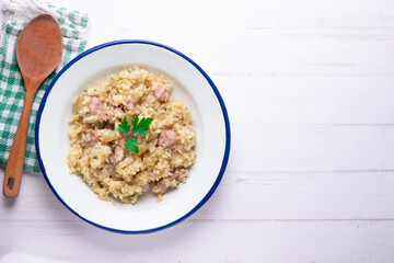 Catalan butifarra sausage risotto with parmesan. Mixed Spanish and Italian recipe.
