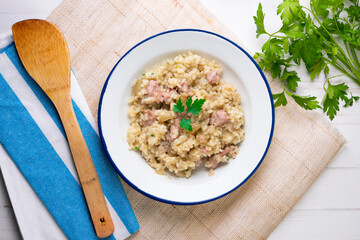 Catalan butifarra sausage risotto with parmesan. Mixed Spanish and Italian recipe.