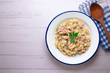 Catalan butifarra sausage risotto with parmesan. Mixed Spanish and Italian recipe.