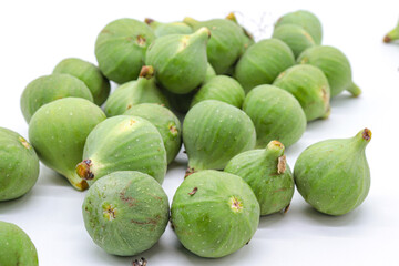 green figs on a white background
