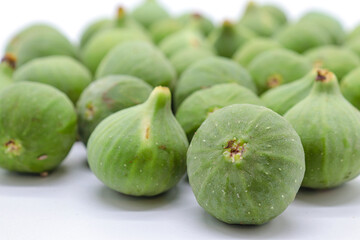green figs on a white background
