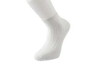 Side view of plastic foot wearing new beautiful and soft natural cotton fabric blank socks isolated on abstract white background. Clothing and sportswear concept. Detailed close-up studio shot.