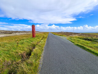 World War Torpedo standing next to road on Tory Island, County Donegal, Ireland © Lukassek