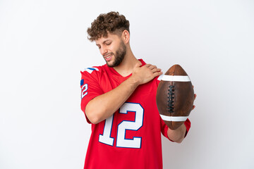Young caucasian man playing rugby isolated on white background suffering from pain in shoulder for having made an effort
