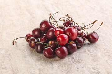 Ripe sweet cherry berries heap