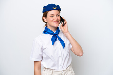 Airplane stewardess woman isolated on white background keeping a conversation with the mobile phone