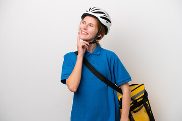Young English woman with thermal backpack isolated on white background thinking an idea while looking up