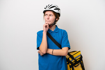 Young English woman with thermal backpack isolated on white background having doubts and thinking