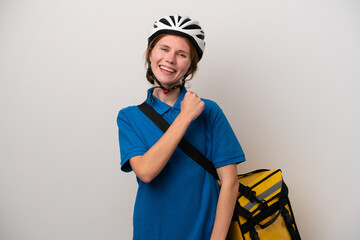 Young English woman with thermal backpack isolated on white background celebrating a victory