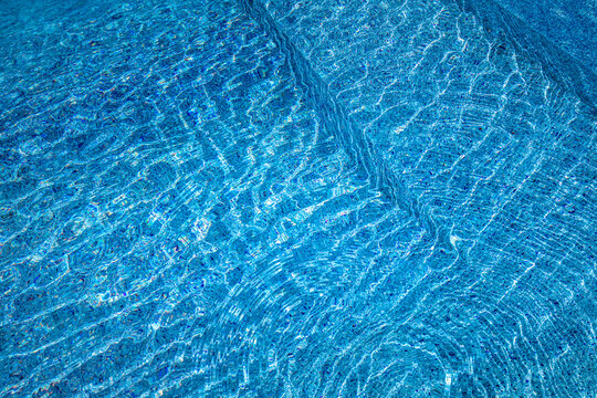 Swimming Pool Water Sunny Reflection Background. Ripple Poolside Water, Backdrop. Summer Fin Recreational Outdoor Activity Concept Design. Blue Water Texture