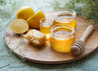 Jar with honey and  flowers