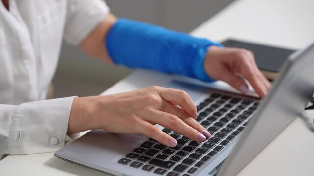 Injured Worker Compensation. Broken Arm Woman