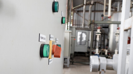 Electrical panel control pump in chiller industry, with shiny light.